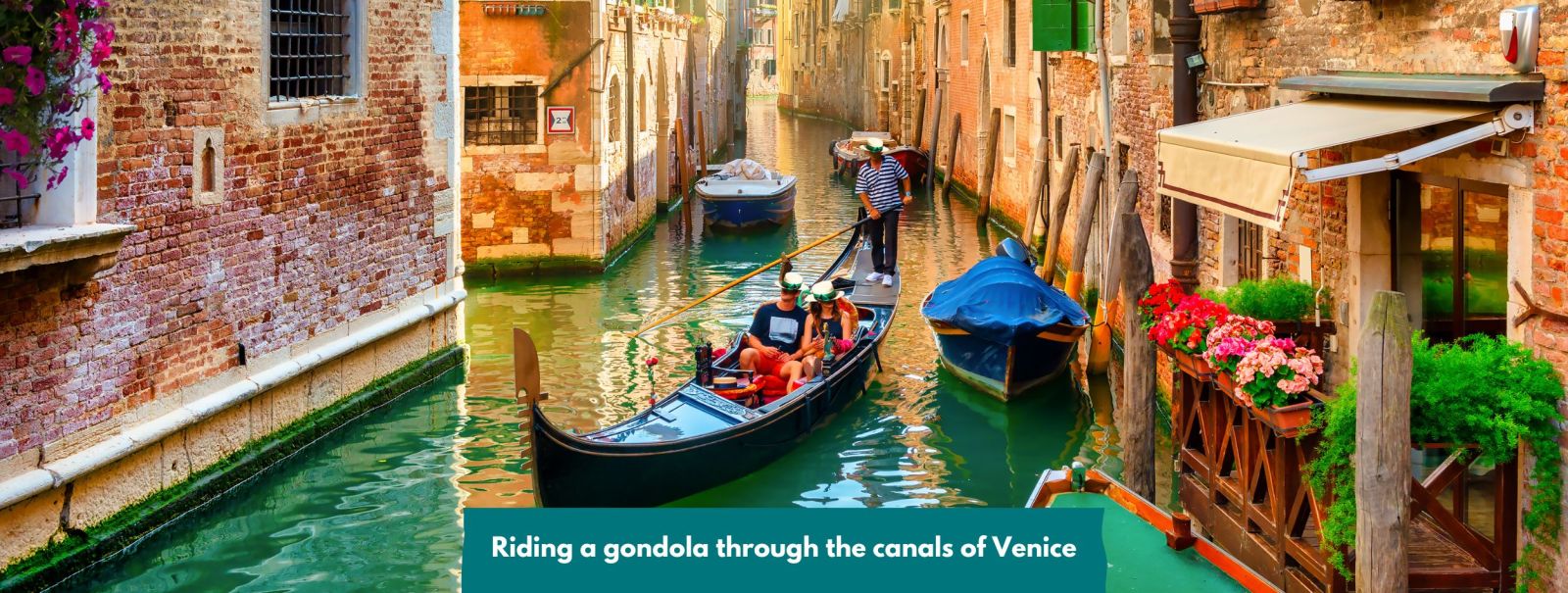 Riding a gondola through the canals of VeniceRiding a gondola through the canals of Venice