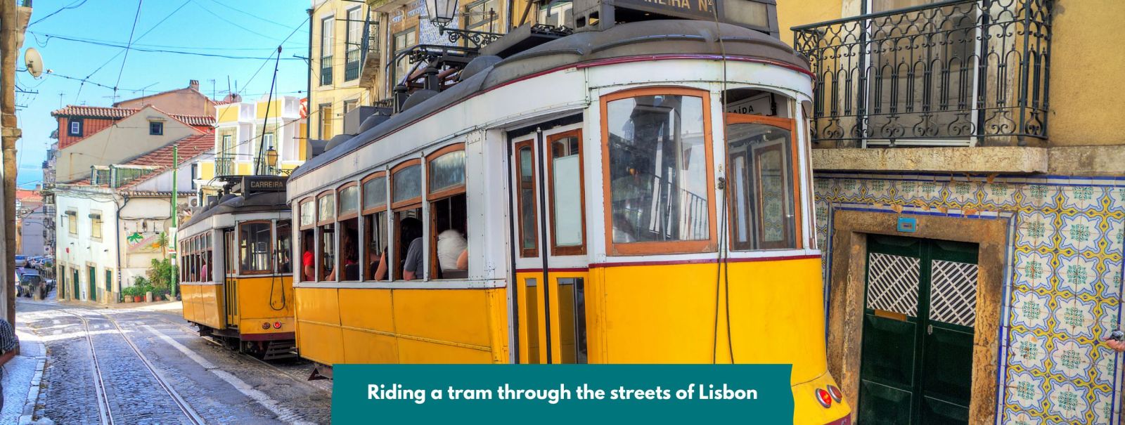 Riding a tram through the streets of Lisbon