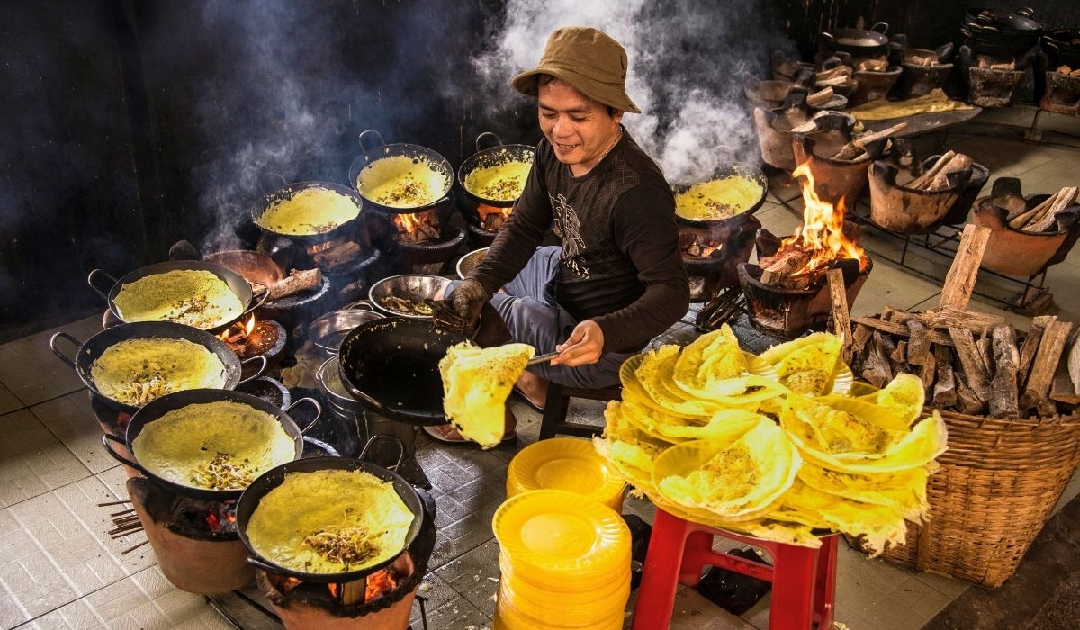 Street food stall serving freshly cooked dishes and seafood