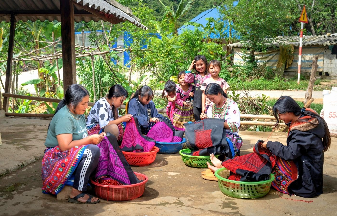 Travellers engaging with artisans at a community market